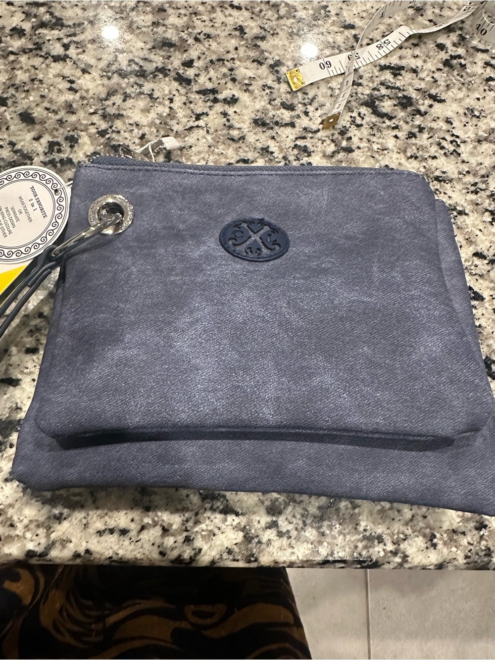 NWT Blue 2 piece Leather Wristlet Pouch with Circular Logo